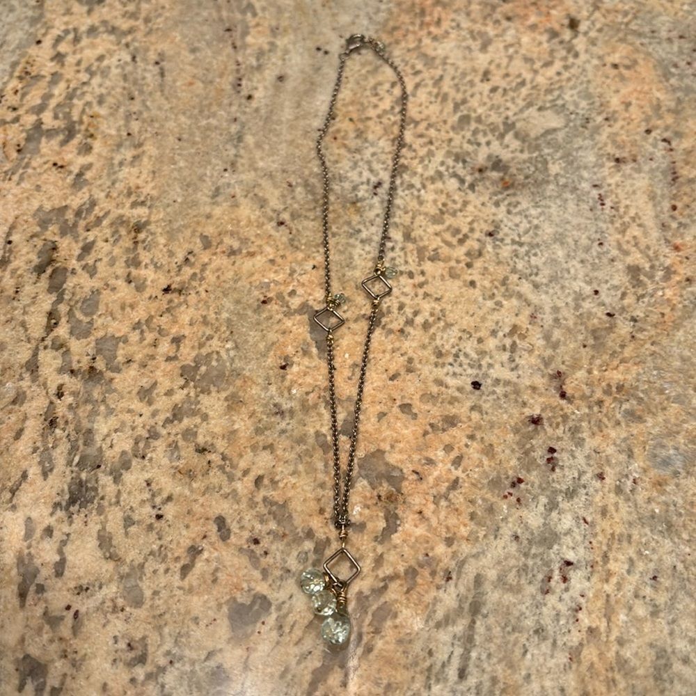 Woman's silver necklace with beads
